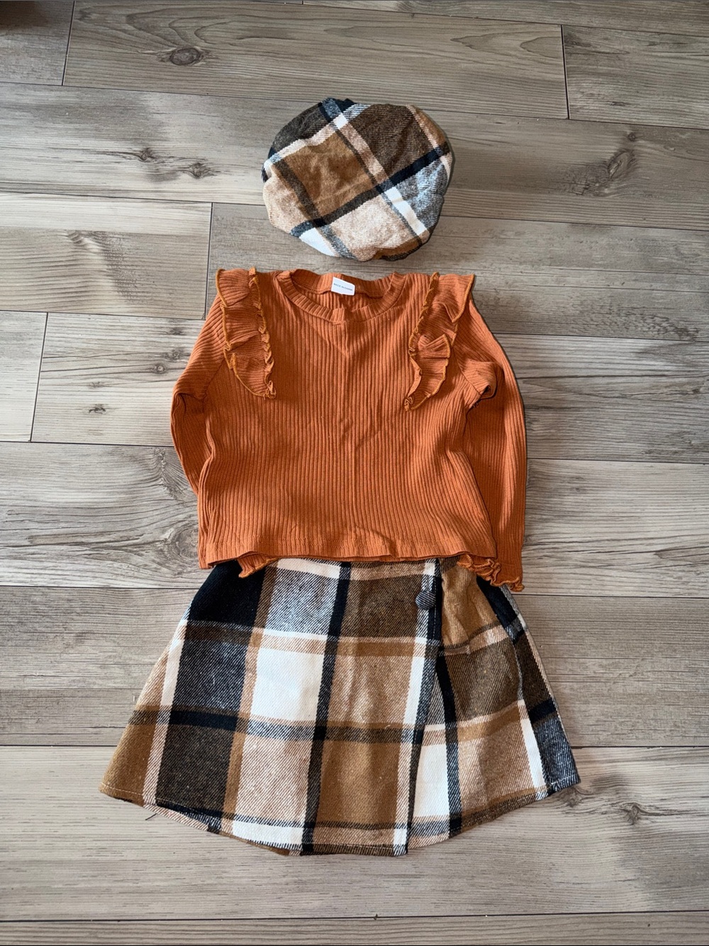 Amazon Orange Ribbed Ruffle Top with Brown Plaid Skirt and Beret